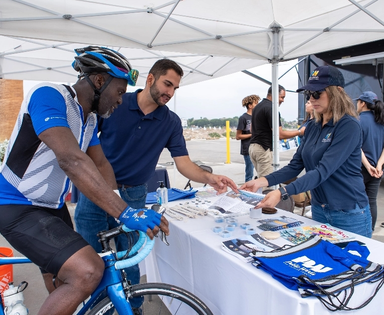 Public Works staff members sharing resources with community members about the Ballona Creek Trash Interceptor Pilot Project